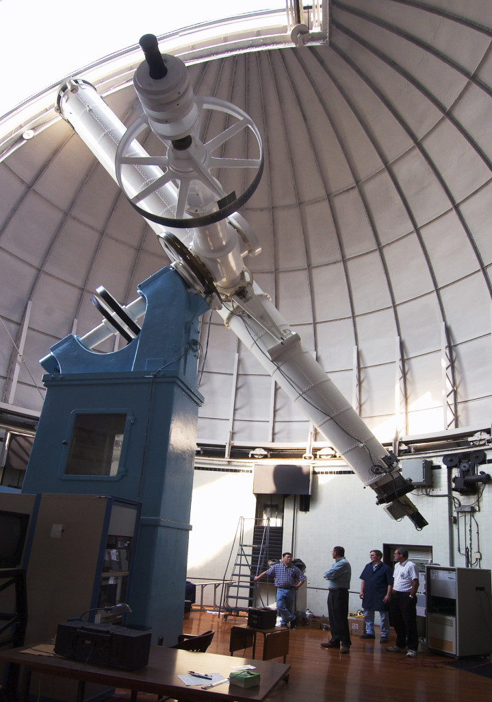 030826-N-9593R-043 Washington, D.C. (August 26, 2003) -- Personnel at the U.S. Naval Observatory in Washington, D.C., prepare the facilities historic 26-inch refractor telescope for optical viewing of Mars. The telescope is the same one that discovered Phobos and Deimos, the two moons of Mars, in 1877. The telescope, which still uses the original optics, normally has a camera known as a speckle interferometer mounted in the viewing position for deep space studies. The United States Naval Observatory (USNO) performs an essential scientific role for the U.S. Navy, and Department of Defense (DOD). Its mission includes determining the positions and motions of the Earth, Sun, Moon, planets, stars, and other celestial objects; providing astronomical reference data; measuring the Earths rotation and orientation; determining precise time; and maintaining the Master Clock for the United States. U.S. Navy photo by Chief Warrant Officer 4 Seth Rossman (RELEASED)